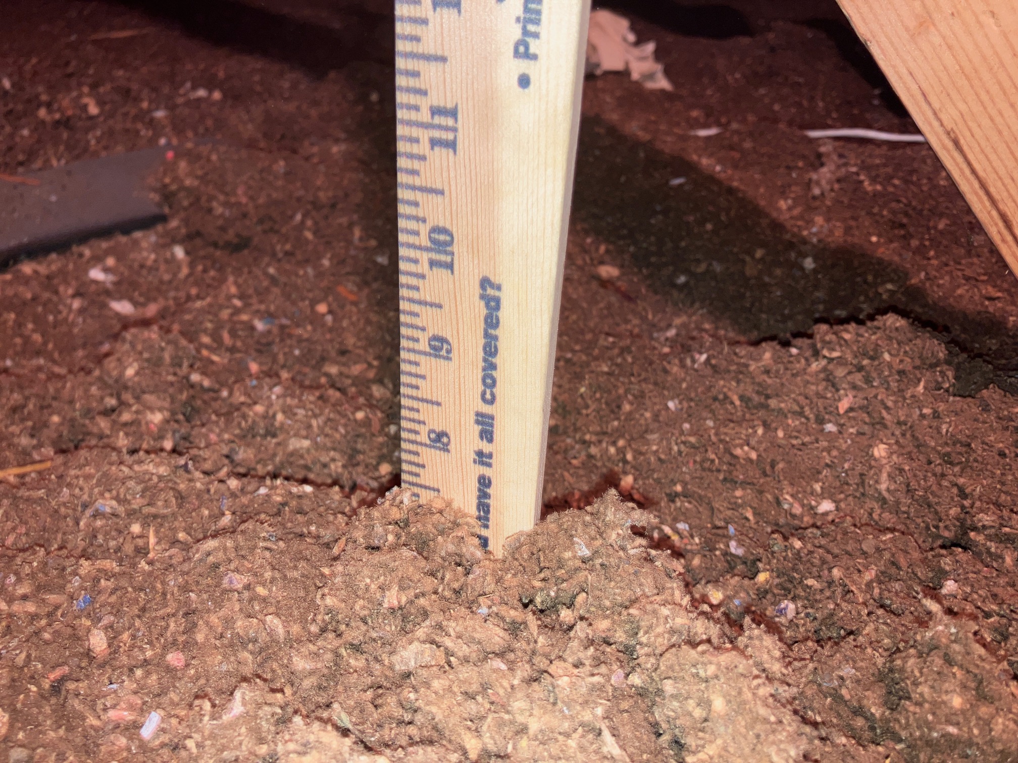 Insulation depth in Spring Hill home during inspection